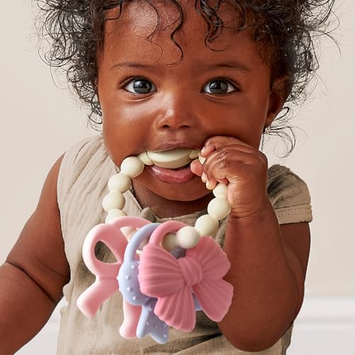 Itzy Ritzy Silicone Teether Trio, Textured Baby Teething Toys Rings (Bows)